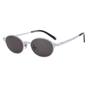 Chic vintage oval sunglasses with silver metal frame and dark lenses.