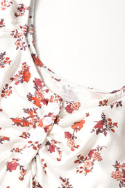 Floral print blouse with gathered bust and button detail