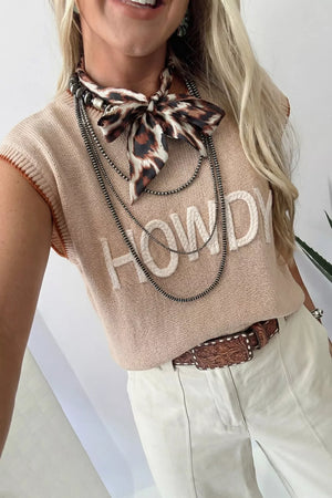 Howdy Textured Knit Sweater Vest in beige with white braided text, sleeveless, crew neck, and orange trim.