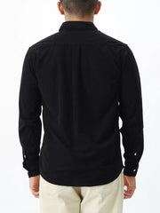 Black long sleeve buttoned shirt with back pleats and buttoned cuffs.