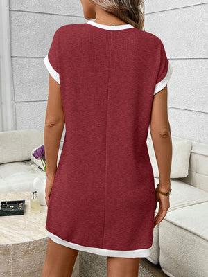 Burgundy ribbed knit mini dress with white trim, short sleeves, and crew neck.