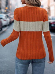 Ribbed crewneck sweater with colorblock detail in Terracotta and light grey.