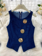 Dark blue cotton denim vest with asymmetrical gold buttons and zipper detail.