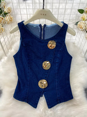 Dark blue cotton denim vest with asymmetrical gold buttons and zipper detail.