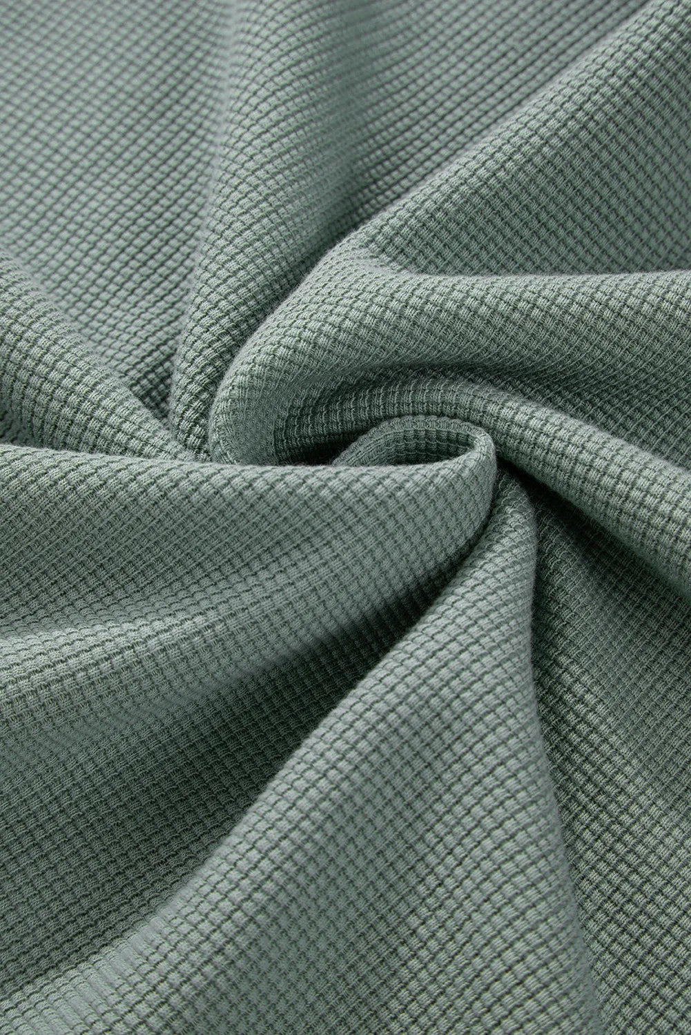 Sage waffle knit cotton sweater fabric detail