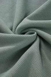 Sage waffle knit cotton sweater fabric detail