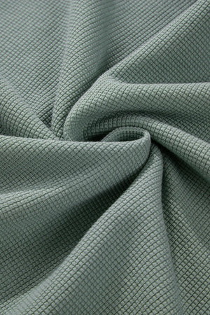 Sage waffle knit cotton sweater fabric detail