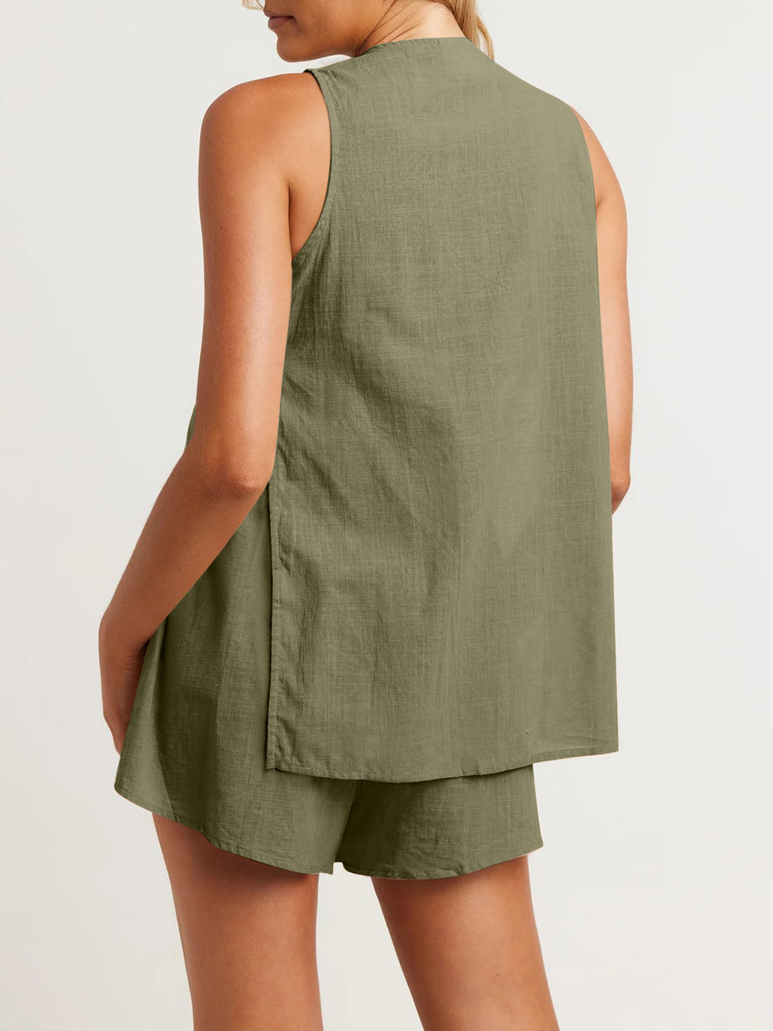 Matcha green linen co-ord set with sleeveless top and shorts, showing back cut-out detail.