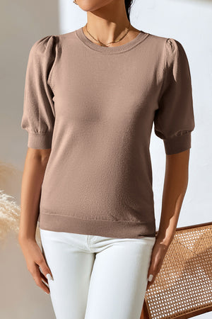 Camel knit sweater with puff short sleeves and crew neck.