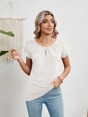 White polyester blouse with keyhole neckline and lace cap sleeves