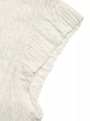 Diamond knit cap sleeve t-shirt in white with textured fabric detail.