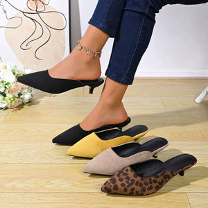 Chic pointed-toe kitten heel mules in black, yellow, apricot, and leopard print.