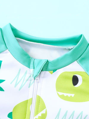 Children's turquoise swimwear set with a zipper and a fun whale print.
