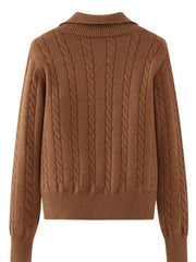 Caramel cable knit quarter-zip pullover sweater with a collared neckline.