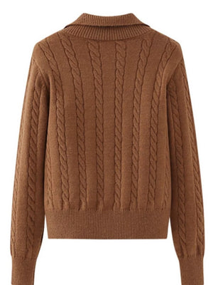 Caramel cable knit quarter-zip pullover sweater with a collared neckline.