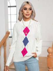 White argyle cable-knit mock neck sweater with pink and blue diamonds.
