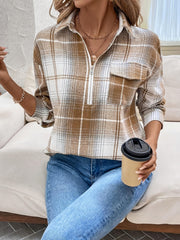 Plaid zip-through utility blouse in camel with a chest pocket and collared neckline.