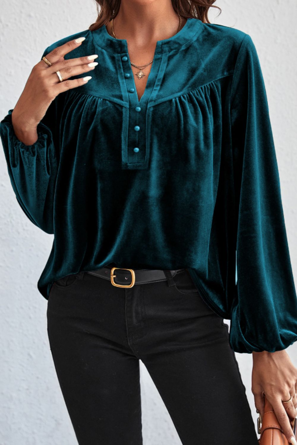 Gathered velvet henley blouse in deep teal with button placket and balloon sleeves.