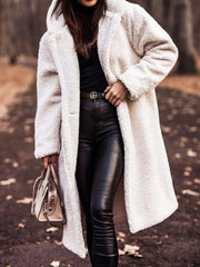 Creamy-white teddy bear longline coat with hood, buttoned front, and pockets.
