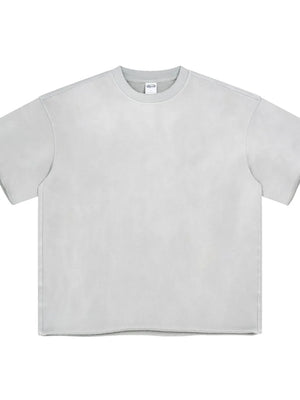 Raw edge boxy t-shirt in light gray with crew neck and short sleeves.