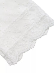 White eyelet lace detail maternity shirt with scalloped trim.