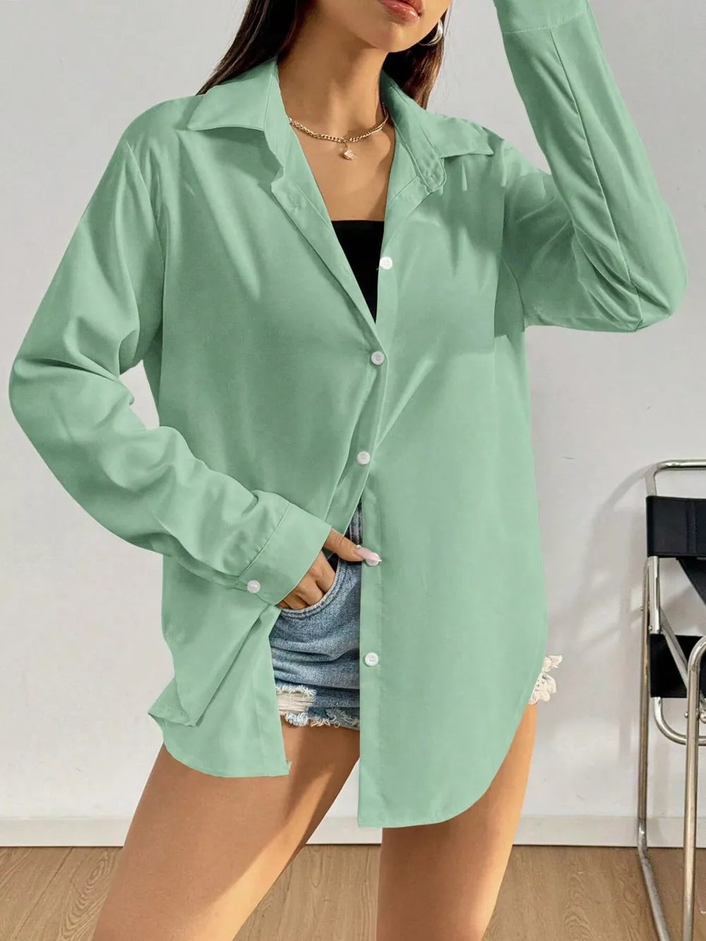 Timeless long sleeve button-up shirt in Gray Green, featuring a classic collar and buttoned front.