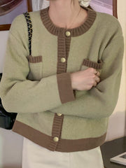 Green acrylic button up cardigan with contrast trim and gold buttons