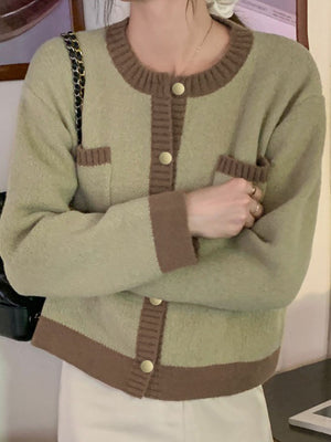 Green acrylic button up cardigan with contrast trim and gold buttons