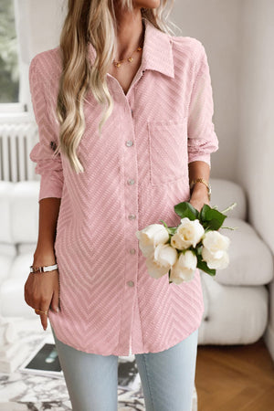 Blush pink textured chevron button-down blouse with a pocket and collared neckline.