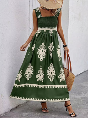 Dark Green smocked square neck maxi dress with white damask print and ruffle straps.