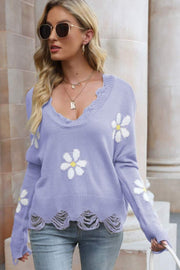 Purple distressed knit sweater with daisy appliques and frayed hem.