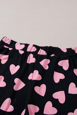 Black lounge set pants with pink heart print and elastic waistband