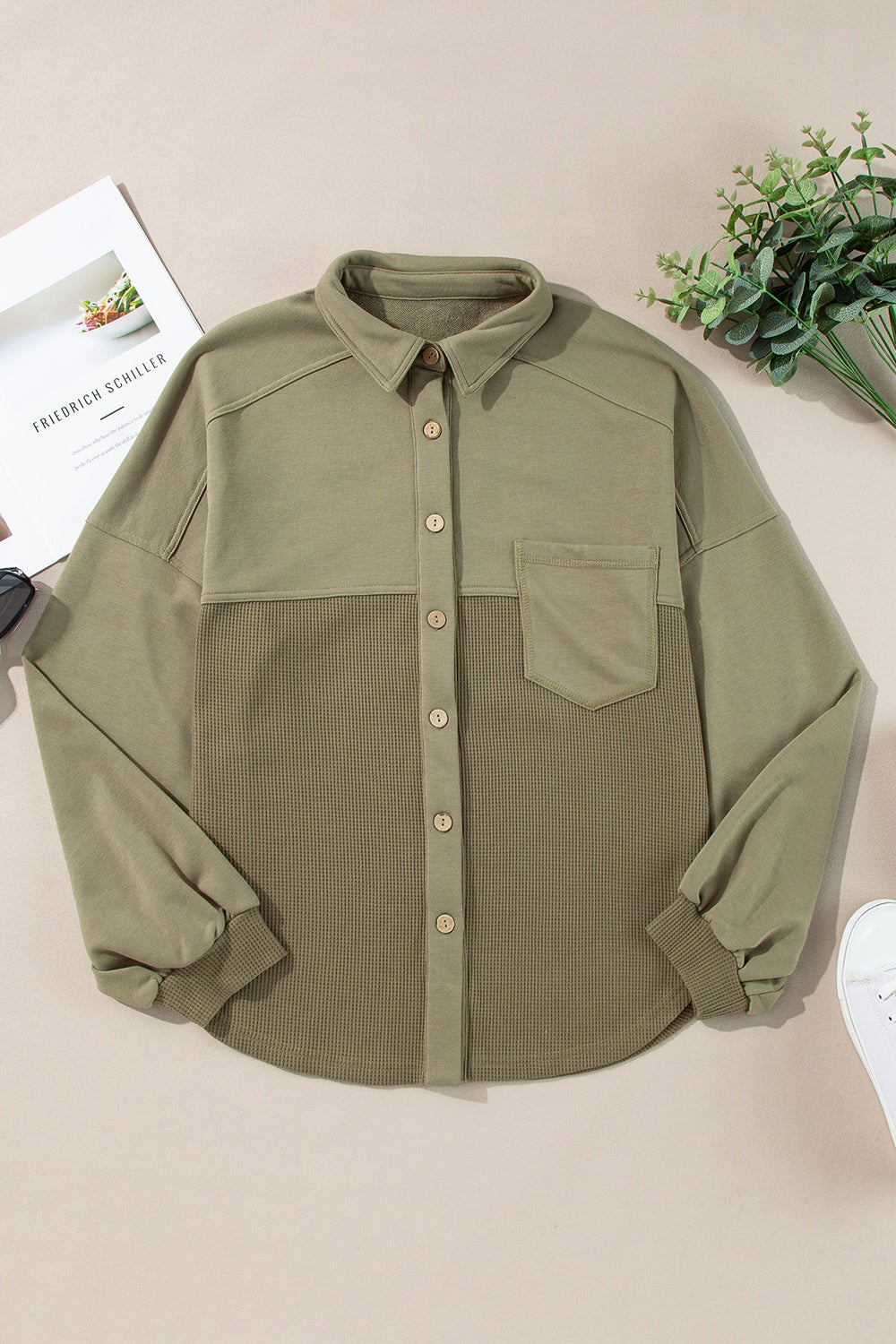 Moss waffle knit shacket with gathered sleeves, collar, and chest pocket.