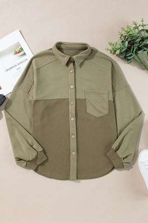 Moss waffle knit shacket with gathered sleeves, collar, and chest pocket.