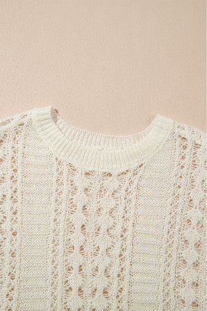 Beige openwork knit beach cover-up with crew neck and intricate diamond pattern.