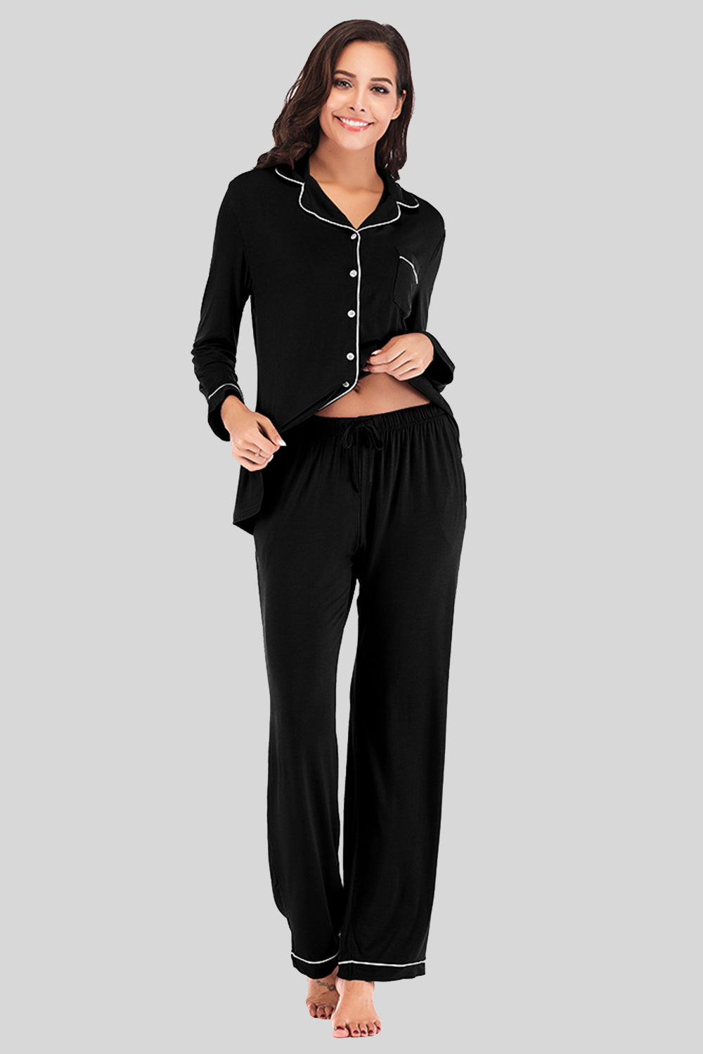 Black piped trim pajama set with long sleeves, button front, and drawstring pants.