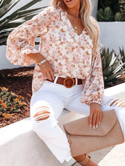 Maternity floral print V-neck long sleeve shirt with buttoned cuffs and a relaxed fit.