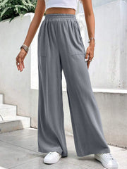 Gray relaxed drape palazzo trousers with pockets and elastic waist
