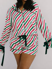 Velvet Ribbon Knot Pajama Set in Stripe pattern with buttoned top and shorts, featuring green trim and bows.