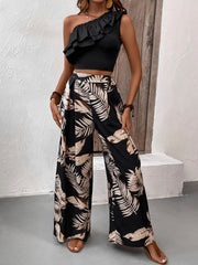 Black asymmetrical ruffle crop top and wide-leg palm print pants set