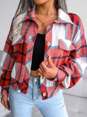 Boxy red plaid shacket with gathered hem and button front.