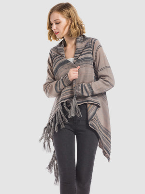 Asymmetric fringe stripe cardigan in tan with dark gray stripes and fringe detail.