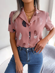 Dusty pink feather print collared puff sleeve blouse with button front.