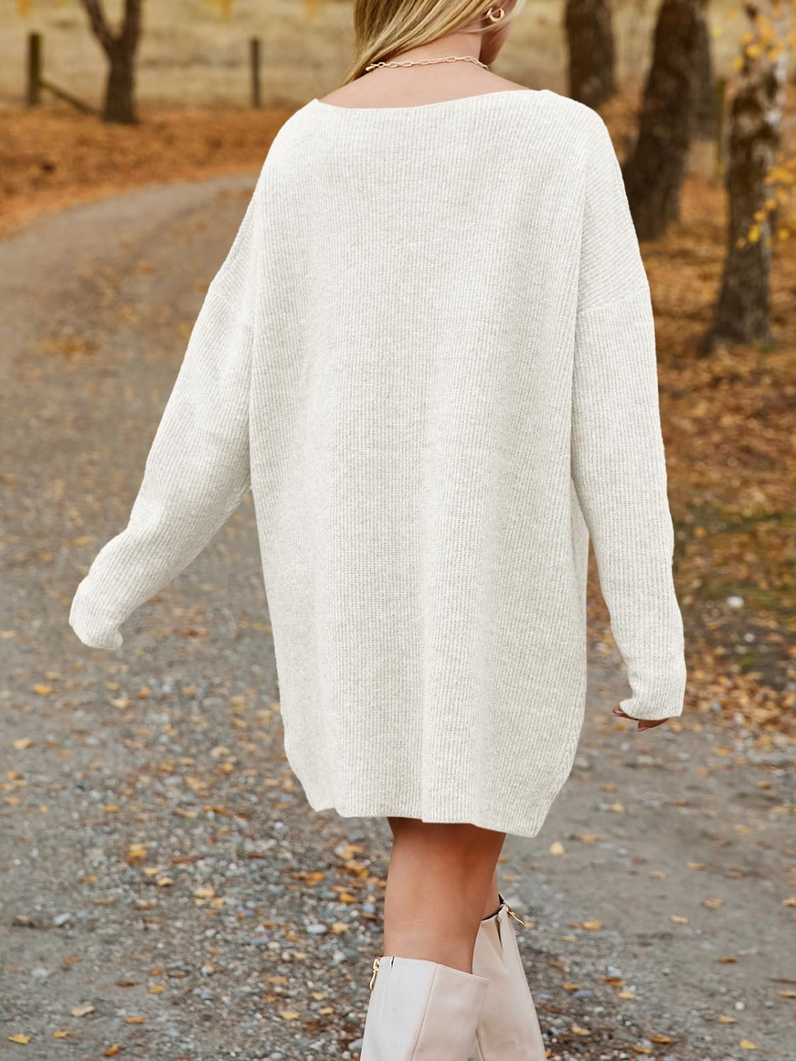 Oversized ribbed knit mini dress in cream with a boat neck and long sleeves.