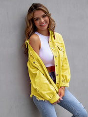 Yellow distressed denim shacket with frayed hem and cuffs.