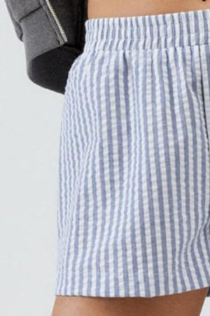 Seersucker boxer shorts in blue and white stripes with an elastic waistband.