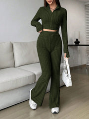Army green ribbed knit flare co-ord set with zip-up crop top and flared pants.