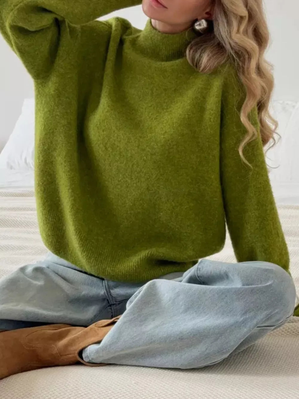 Moss green relaxed mock neck knit sweater with textured acrylic blend fabric.