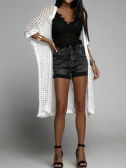 White open-knit duster cardigan with a breathable acrylic weave, long sleeves and open front.