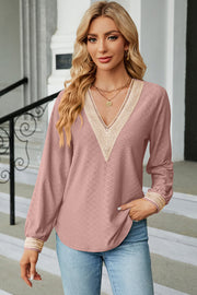 Dusty Pink textured V-neck blouse with lace trim on neckline and cuffs.